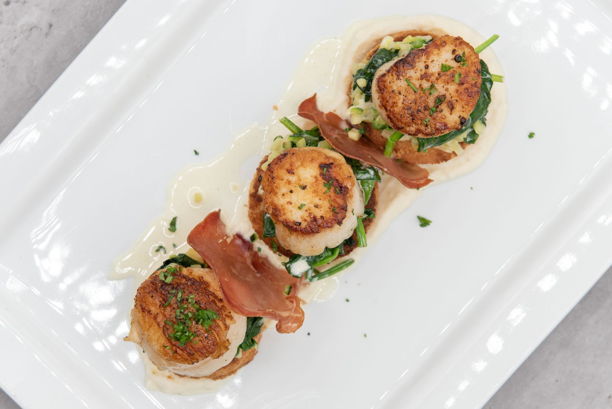 Scallops with Anchovies and Kale