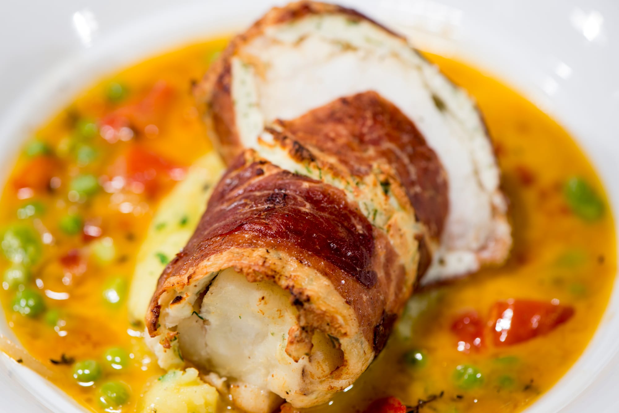 Ham-Wrapped Hake with Curried Potatoes